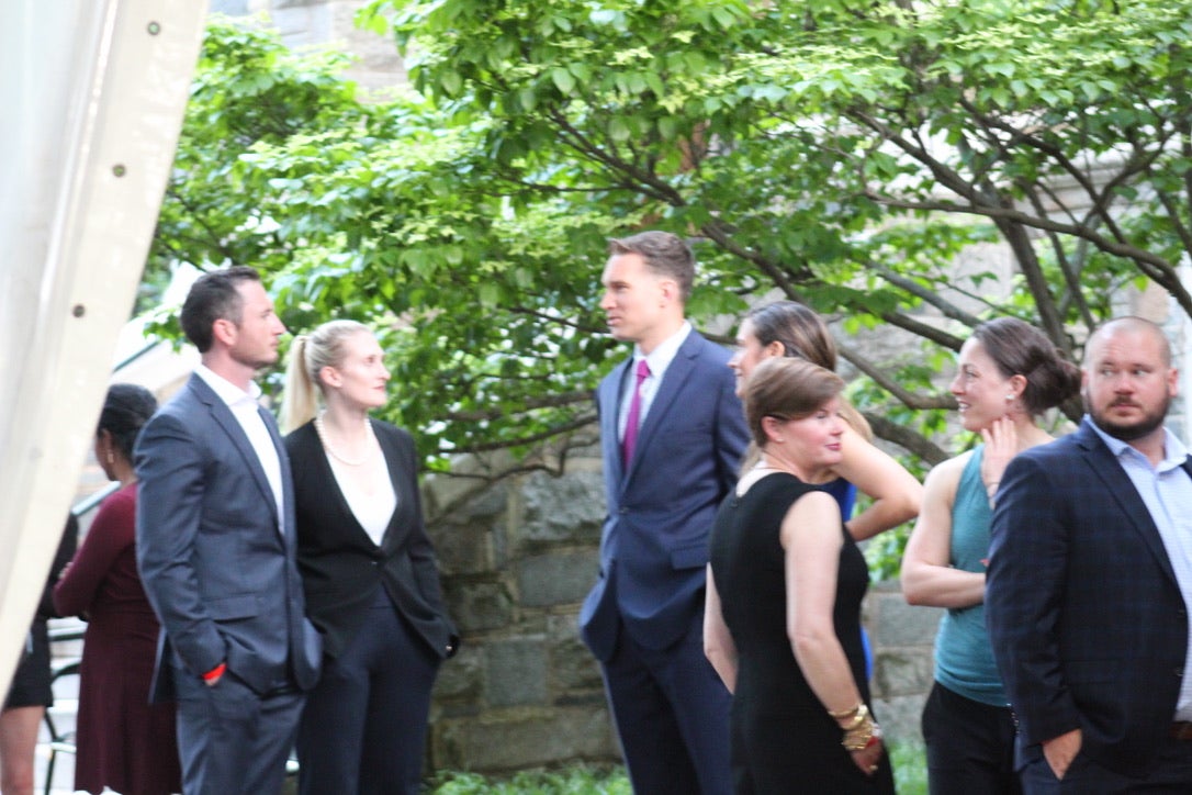 group of students talking outside
