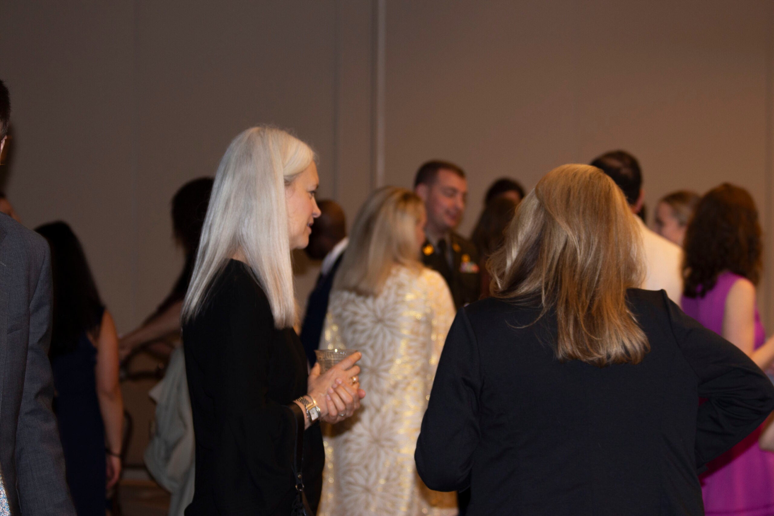 Group of attendees talking