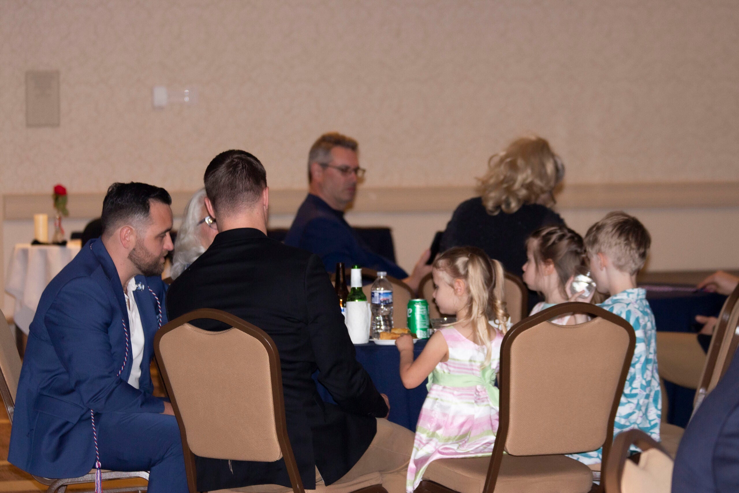 Attendees sitting at a table