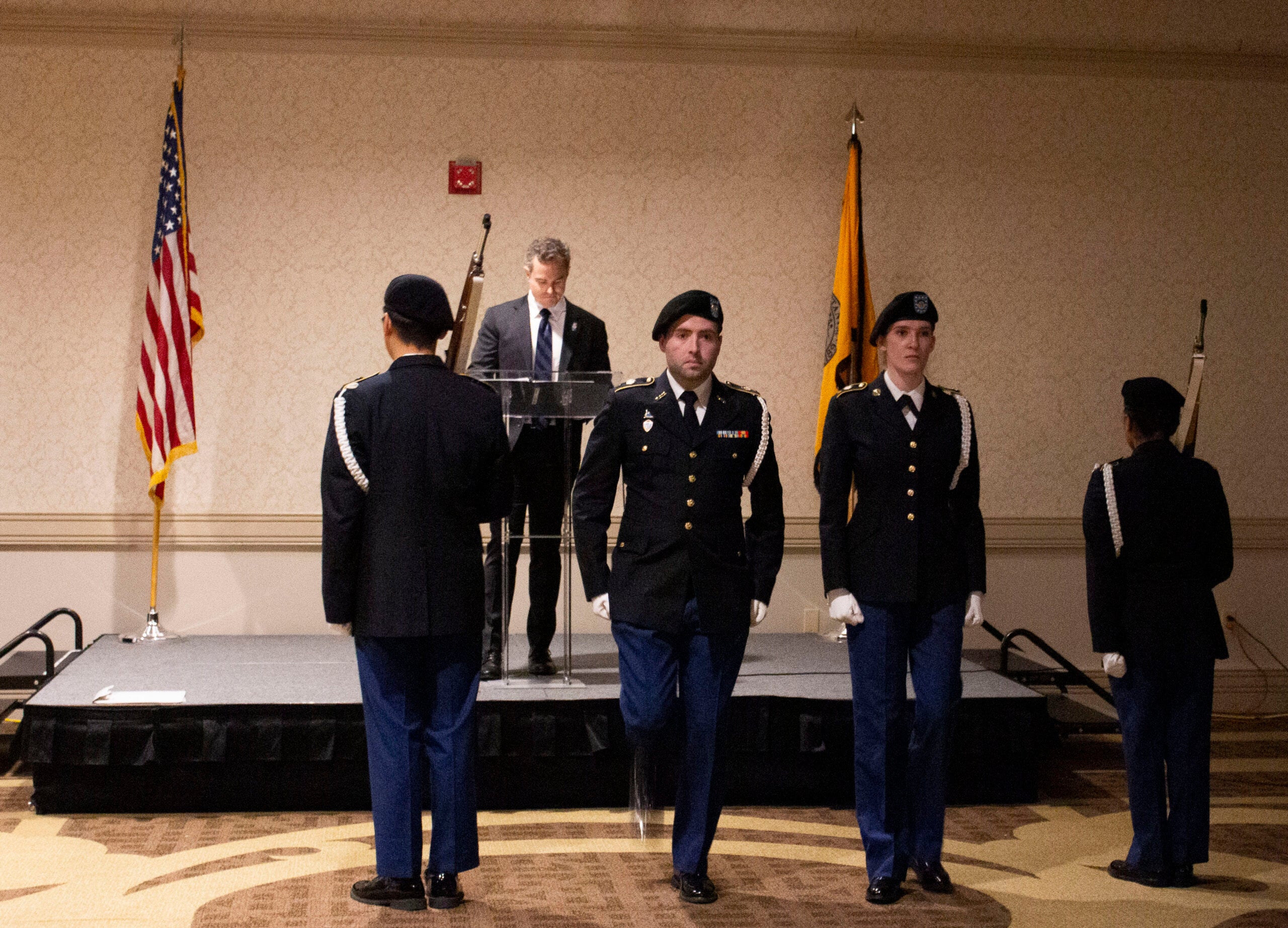 Army ROTC color guard in front of stage