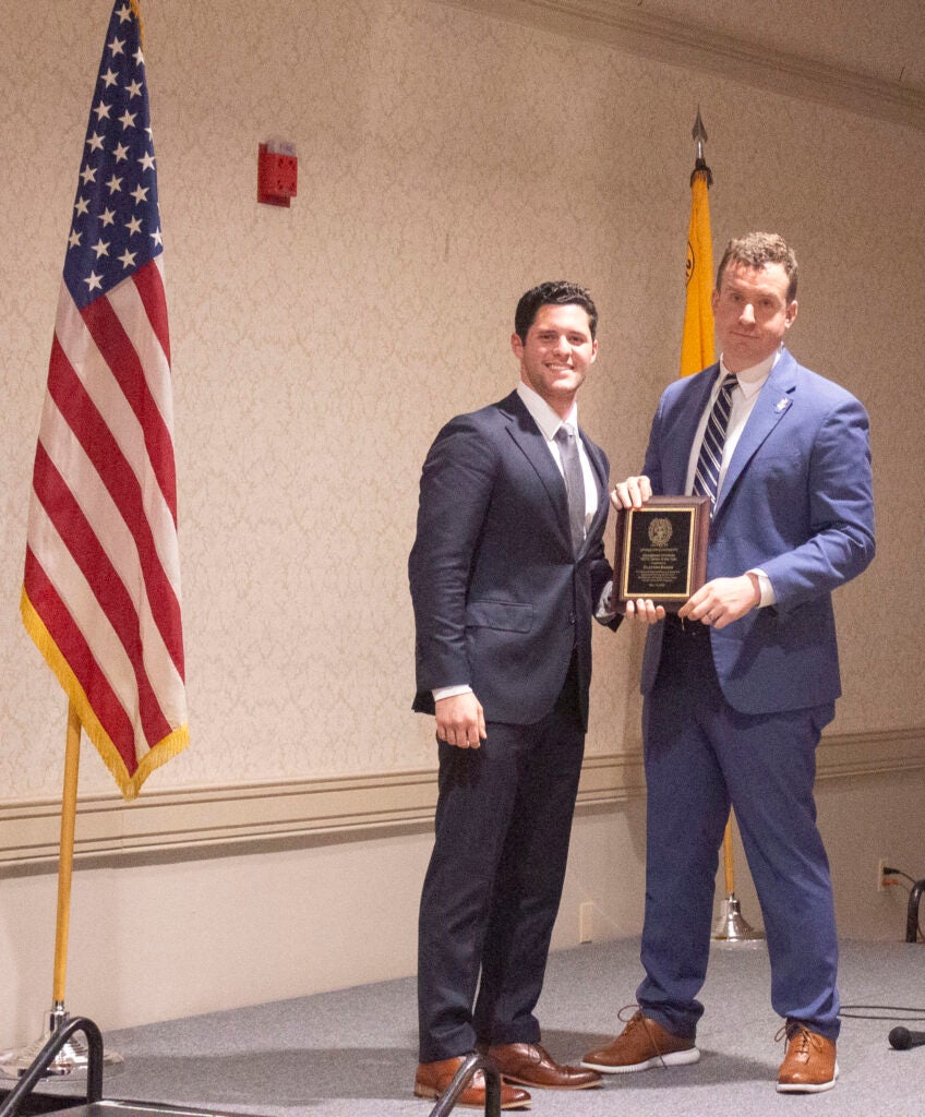 Student receiving award