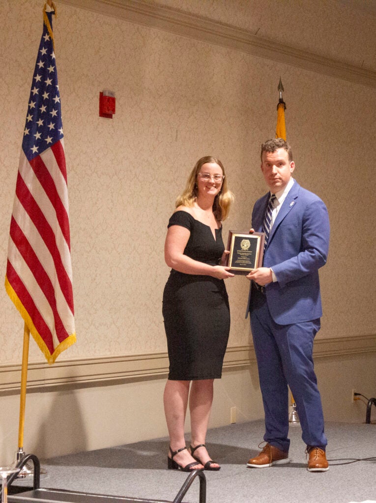 Student receiving award