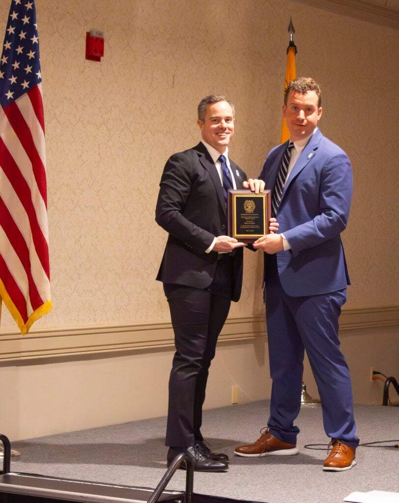 Student receiving award