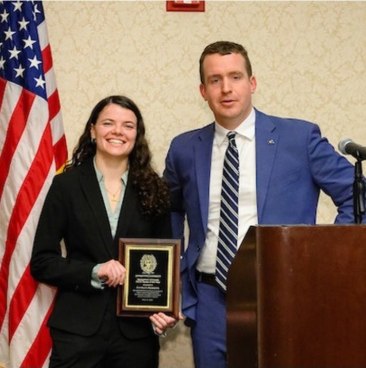 Student receiving award