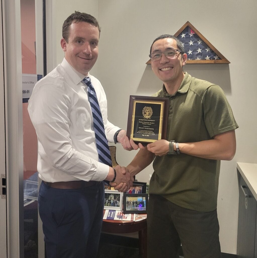Student receiving award