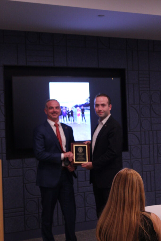 Neil Thorley receiving plaque