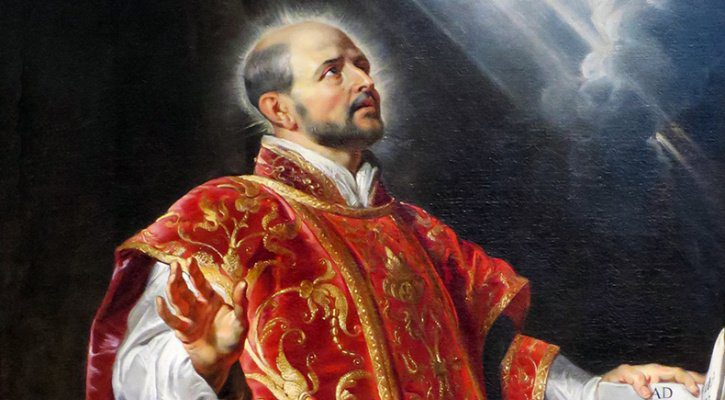 A saint in a red robe with a dark cloudy background